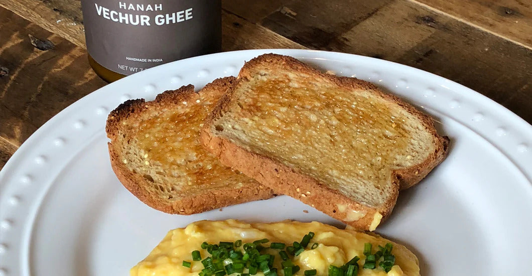 Nutritious HANAH Vechur Ghee scrambled eggs with toast garnished with chives