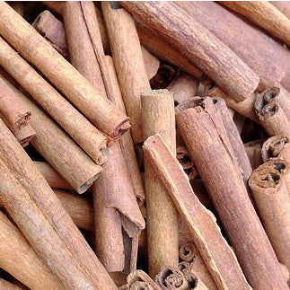 Piles of rolls of cinnamon sticks