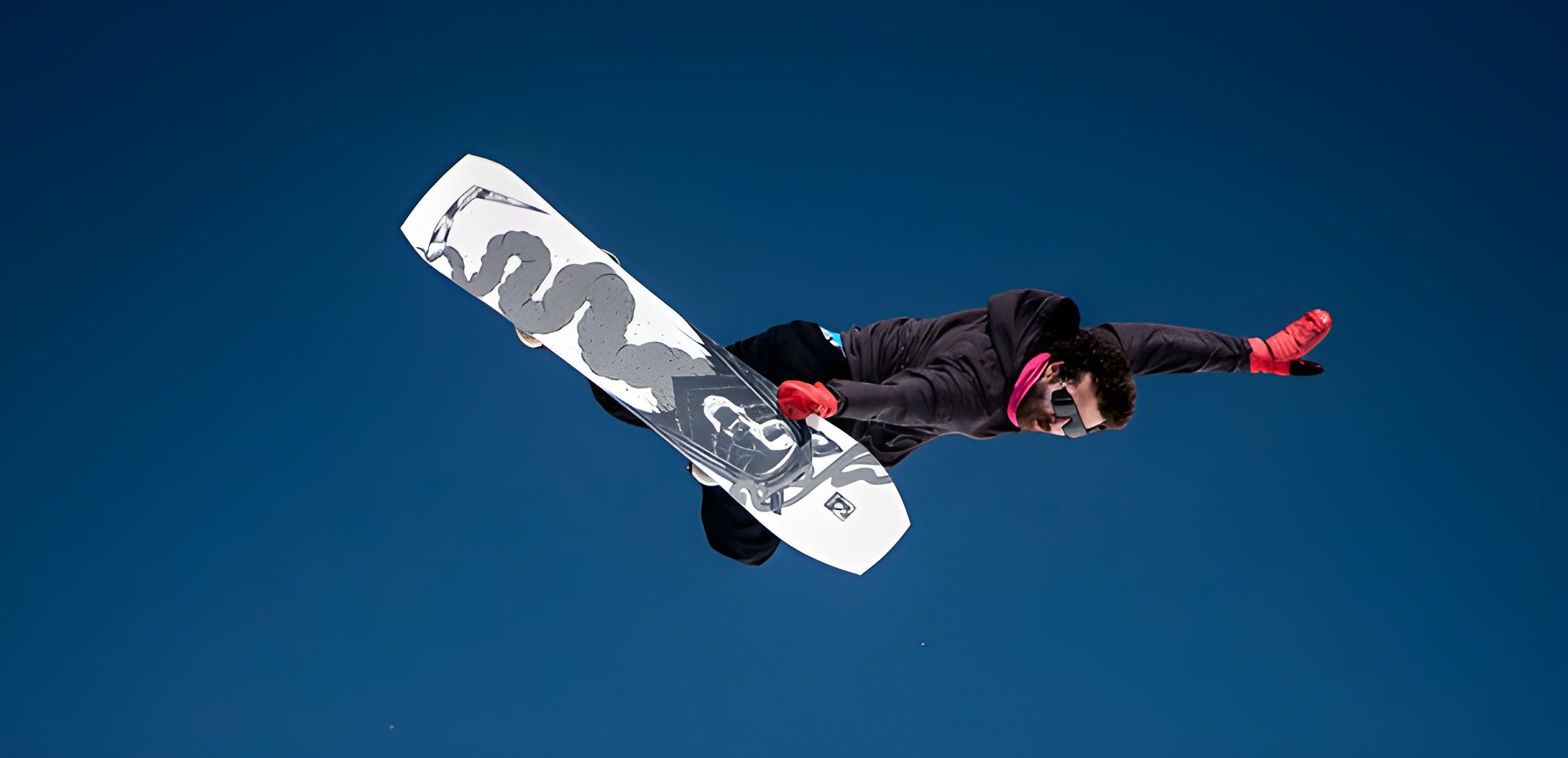 HANAH Hero JJ Thomas taking a leap on his snowboard